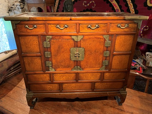 Lot 463 - A Korean elm brass mounted cupboard, late 19th century