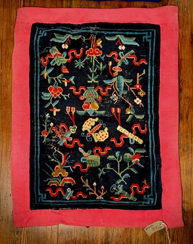 Lot 465 - A Tibetan woollen small rug, circa 1900-1920