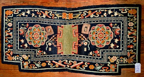 Lot 466 - A Tibetan wool saddle bottom rug Makden, circa 1900-1930