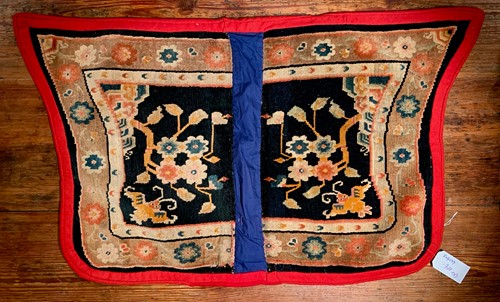 Lot 467 - A Tibetan wool saddle bottom rug Makden, circa 1900-1930