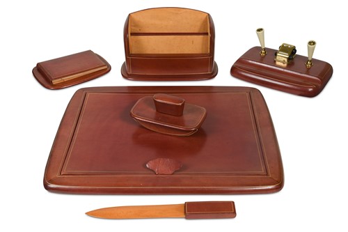 Lot 791 - A good quality Italian six-piece cognac leather desk set