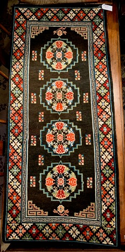 Lot 470 - A Sino-Tibetan wool carpet