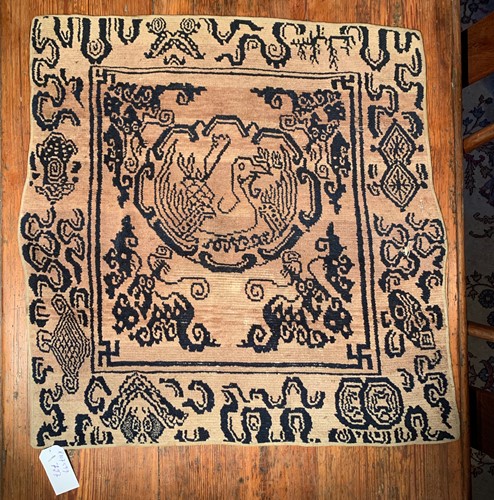 Lot 471 - A Tibetan wool single seat rug, circa 1900-1930