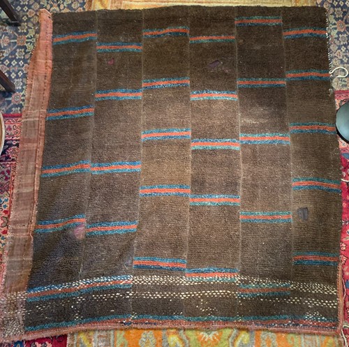 Lot 176 - A Tibet wool nomadic rug, early 20th century,...