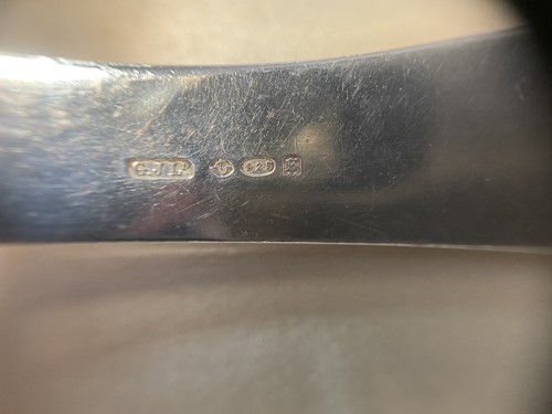 Lot 92 - Harald Nielsen for Georg Jensen, a Danish metalwares pyramid pattern cake slice and fork