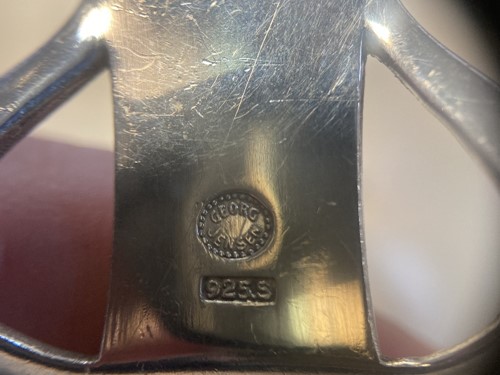 Lot 92 - Harald Nielsen for Georg Jensen, a Danish metalwares pyramid pattern cake slice and fork