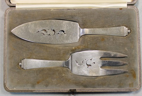 Lot 92 - Harald Nielsen for Georg Jensen, a Danish metalwares pyramid pattern cake slice and fork