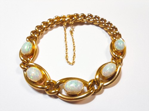 Lot 214 - A link bracelet set with opals