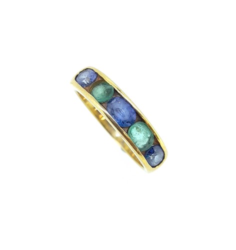 Lot 24 - A sapphire and emerald half hoop ring