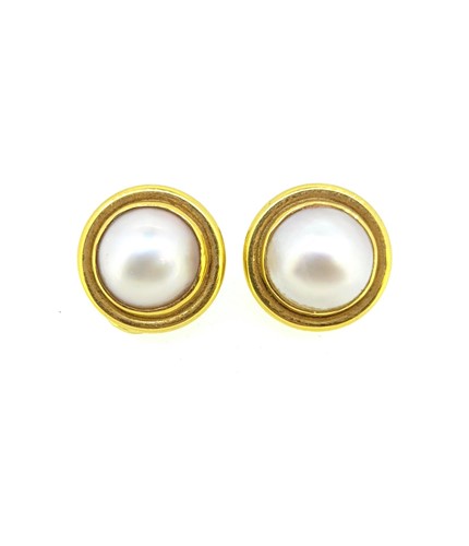 Lot 76 - A pair of 18ct gold mabé pearl set ear clips