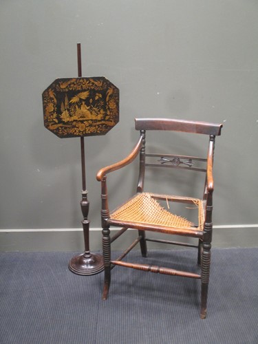 Lot 557 - A 19th century firescreen pole, the canted...
