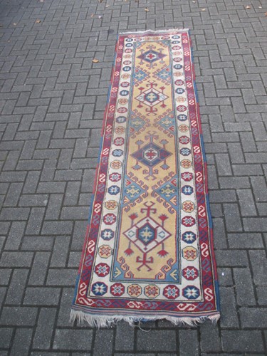 Lot 580 - A Kazak style runner 281 x 75cm