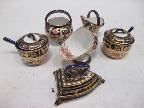 Lot 105 - A group of Royal Crown Derby miniature...
