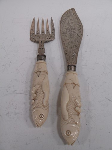 Lot 223 - A pair of aesthetic movement silver fish...