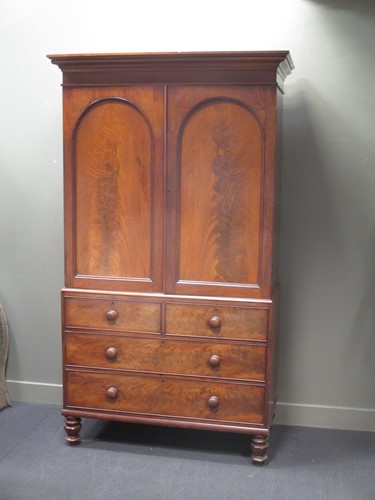 Lot 539 - A Victorian mahogany linen press, with a pair...