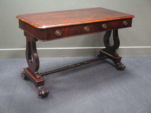 Lot 639 - A 19th century rosewood library table, with...