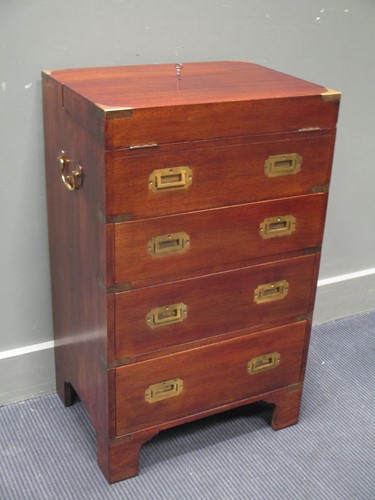 Lot 545 - A military campaign style mahogany desk with...