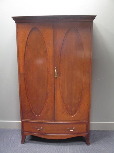 Lot 599 - An Edwardian cross banded mahogany bow front...