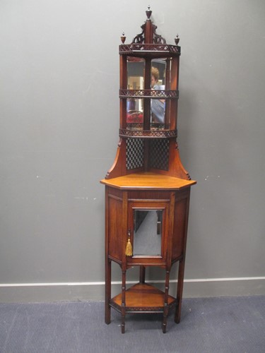Lot 568 - A late Victorian mahogany mirror back corner...