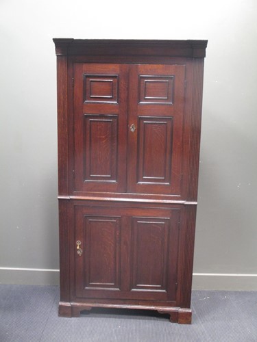 Lot 516 - A George III north country oak full height...