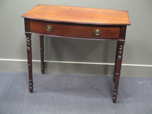 Lot 497 - A late George III mahogany bow front side...