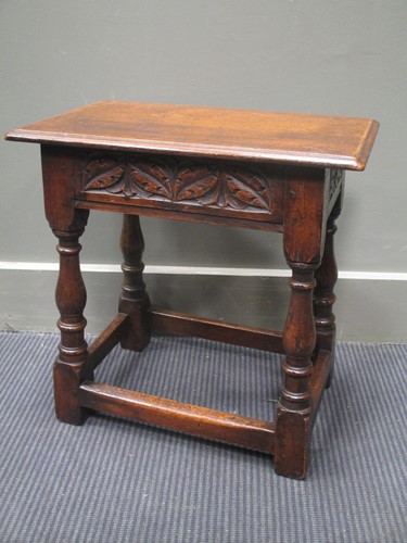 Lot 616 - A 17th century style oak joined stool with...