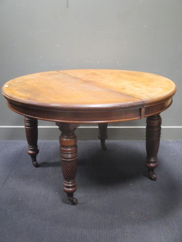 Lot 625 - A late Victorian walnut extending dining table,...