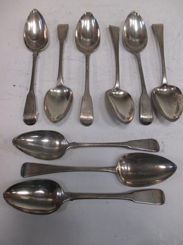 Lot 197 - Nine various large table spoons, c.22oz