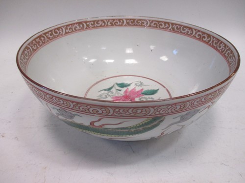 Lot 102 - A 19th century Chinese punch bowl the border...