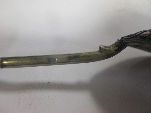 Lot 228 - A Russian enamel silver tea spoon together...
