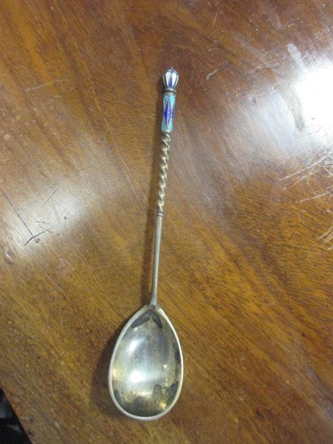 Lot 228 - A Russian enamel silver tea spoon together...