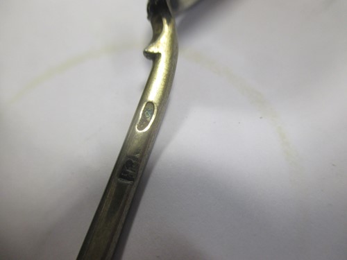 Lot 228 - A Russian enamel silver tea spoon together...