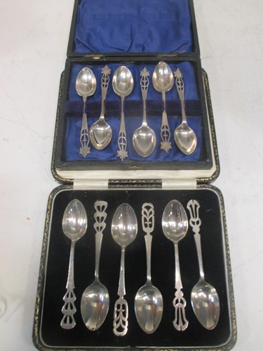 Lot 239 - Two sets of 6 silver teaspoons