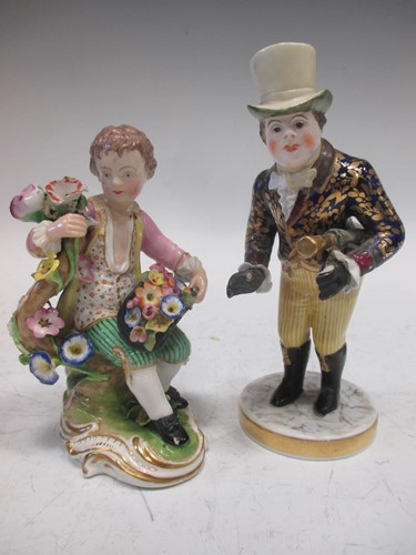 Lot 98 - A 19th century Derby figure of a gentleman in...