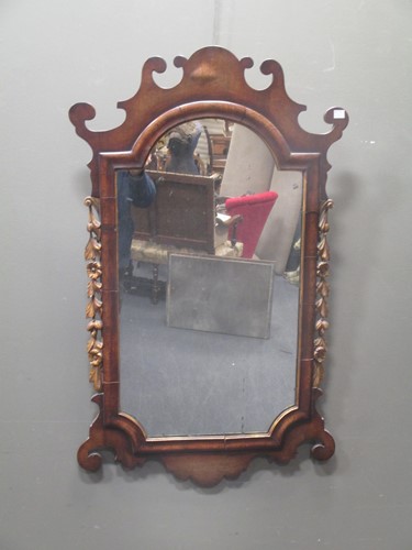 Lot 588 - A George III style fret carved wall mirror...