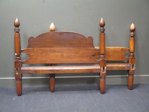 Lot 560 - A 19th century walnut single bed with shaped...