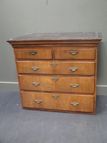Lot 532 - A George I walnut chest on chest top section...