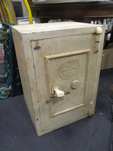 Lot 640 - A small 20th century safe, 61cm high x 43 wide...