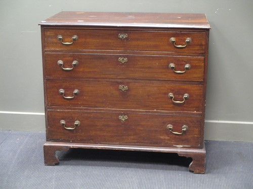 Lot 606 - An early 19th century chest of four long...