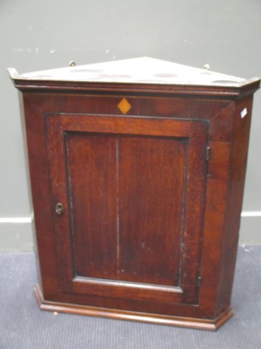 Lot 641 - An early 19th century oak plate rack, 107 x...