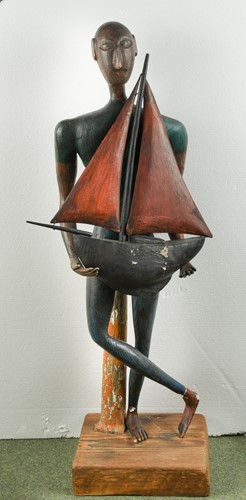 Lot 217 - A wood and plaster figure of standing ethnic...