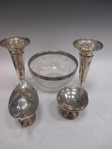 Lot 232 - A pair of silver trumpet vases, an urn shaped...