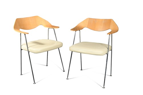 Lot 209 - After Robin Day, a pair of model 675 armchairs, circa 1990
