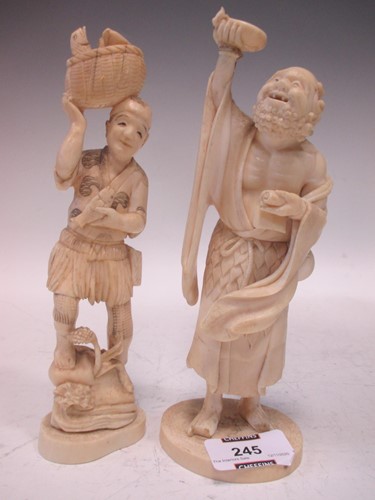 Lot 245 - An ivory okimono of a Sennin 19.5cm high,...