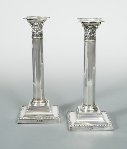 Lot 382 - A pair of Edward VII silver candlesticks