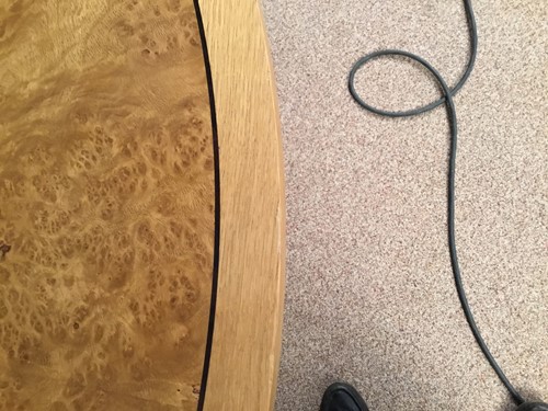 Lot 380 - A pale oak and birds eye maple extending dining table by David Linley