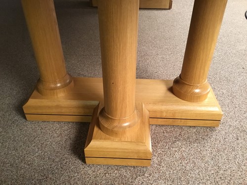 Lot 380 - A pale oak and birds eye maple extending dining table by David Linley