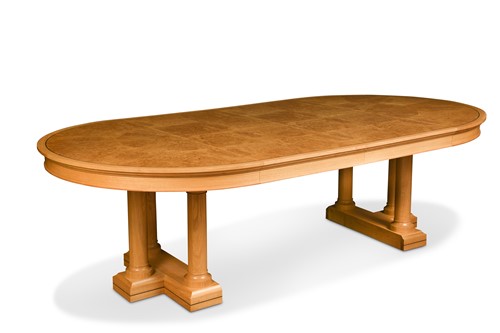 Lot 380 - A pale oak and birds eye maple extending dining table by David Linley