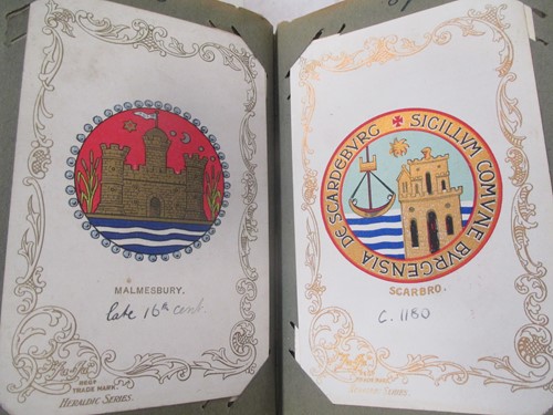 Lot 377 - A collection of old postcards and postage...