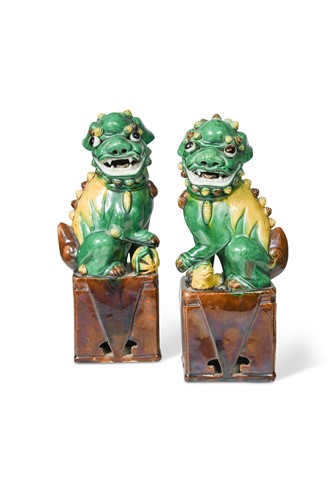 Lot 391 - A pair of Chinese porcelain Fo dogs, probably Emperor Kangxi (1662-1722)